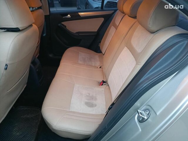 Бежевий Фольксваген Джетта, об'ємом двигуна 1.8 л та пробігом 163 тис. км за 9990 $, фото 12 на Automoto.ua