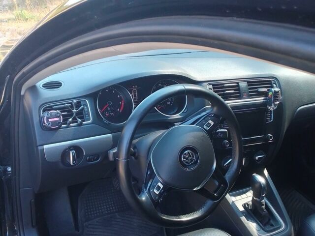 Фольксваген Джетта 2016 в Луцке на Automoto.ua Черный Фольксваген Джетта, объемом двигателя 1.4 л и пробегом 135 тыс. км за 8700 $, фото 14 на Automoto.ua