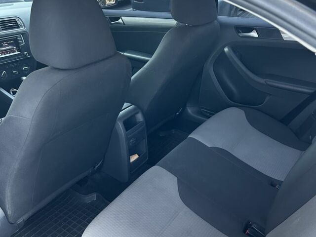 Черный Фольксваген Джетта, объемом двигателя 1.4 л и пробегом 160 тыс. км за 7900 $, фото 7 на Automoto.ua