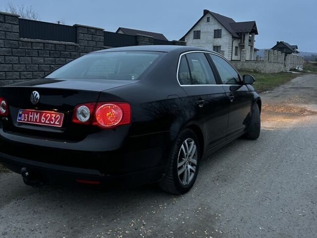 Черный Фольксваген Джетта, объемом двигателя 1.4 л и пробегом 260 тыс. км за 6550 $, фото 2 на Automoto.ua