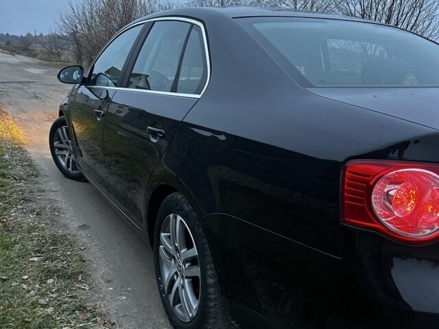 Черный Фольксваген Джетта, объемом двигателя 1.4 л и пробегом 260 тыс. км за 6550 $, фото 5 на Automoto.ua