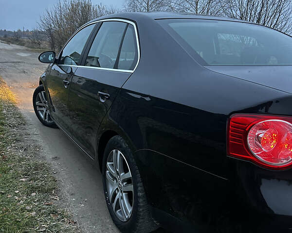 Черный Фольксваген Джетта, объемом двигателя 1.4 л и пробегом 260 тыс. км за 6550 $, фото 2 на Automoto.ua