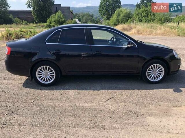 Чорний Фольксваген Джетта, об'ємом двигуна 1.39 л та пробігом 157 тис. км за 5300 $, фото 1 на Automoto.ua
