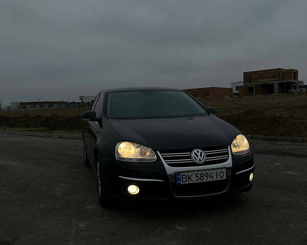 Черный Фольксваген Джетта, объемом двигателя 1.4 л и пробегом 216 тыс. км за 7500 $, фото 14 на Automoto.ua
