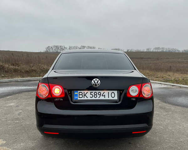 Черный Фольксваген Джетта, объемом двигателя 1.4 л и пробегом 216 тыс. км за 7500 $, фото 20 на Automoto.ua