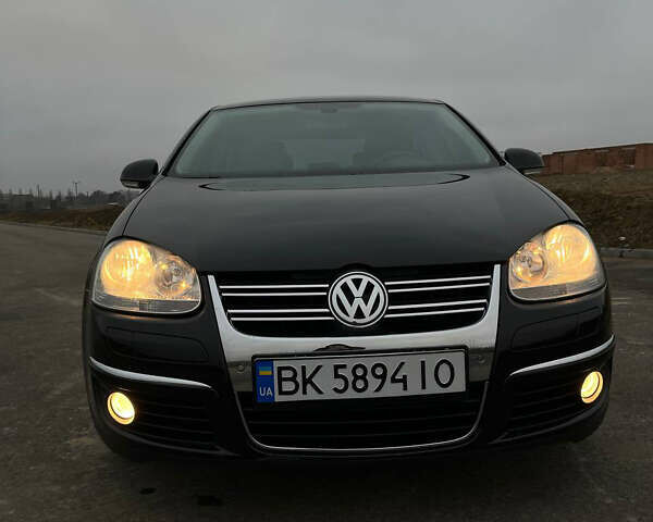 Черный Фольксваген Джетта, объемом двигателя 1.4 л и пробегом 216 тыс. км за 7500 $, фото 9 на Automoto.ua
