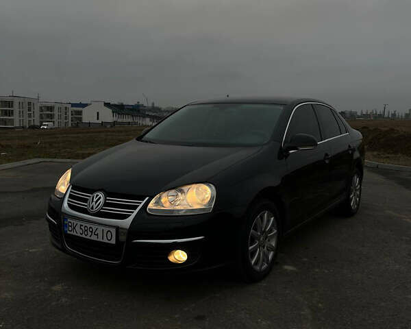 Черный Фольксваген Джетта, объемом двигателя 1.4 л и пробегом 216 тыс. км за 7500 $, фото 12 на Automoto.ua