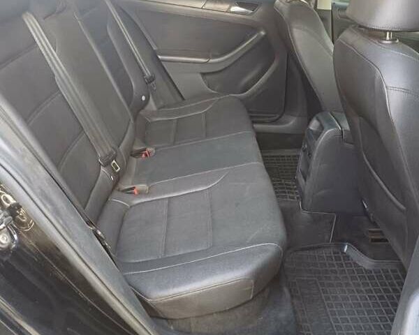 Черный Фольксваген Джетта, объемом двигателя 2.48 л и пробегом 220 тыс. км за 7800 $, фото 1 на Automoto.ua