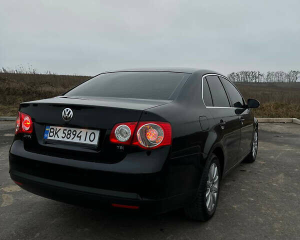 Черный Фольксваген Джетта, объемом двигателя 1.4 л и пробегом 216 тыс. км за 7500 $, фото 17 на Automoto.ua