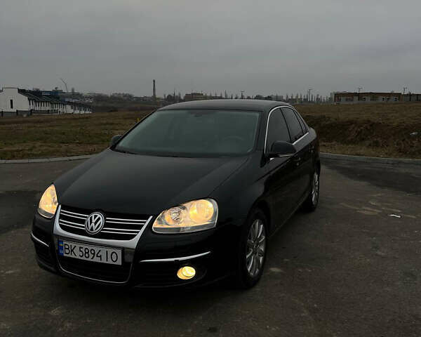 Черный Фольксваген Джетта, объемом двигателя 1.4 л и пробегом 216 тыс. км за 7500 $, фото 16 на Automoto.ua