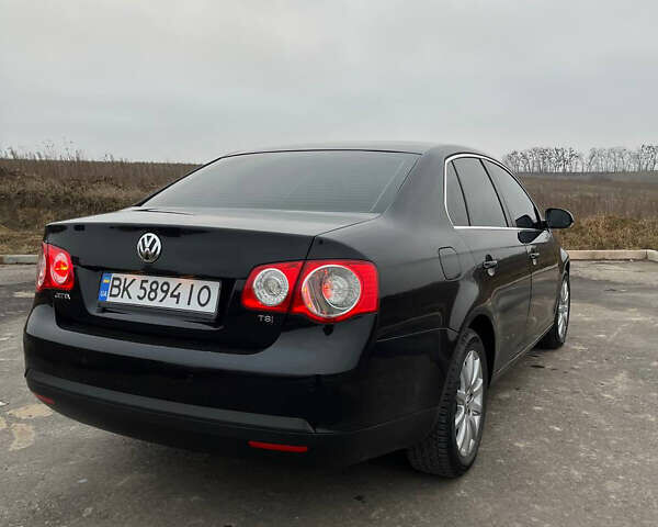Черный Фольксваген Джетта, объемом двигателя 1.4 л и пробегом 216 тыс. км за 7500 $, фото 18 на Automoto.ua