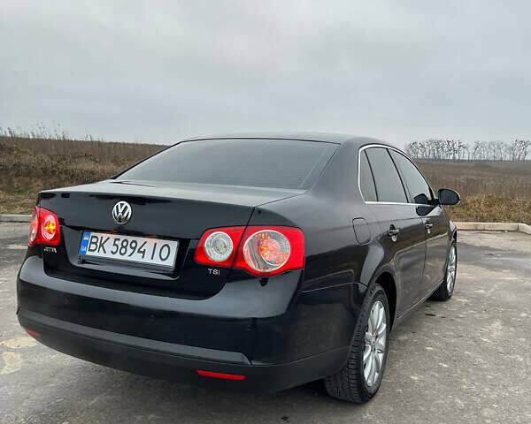 Черный Фольксваген Джетта, объемом двигателя 1.4 л и пробегом 216 тыс. км за 7500 $, фото 21 на Automoto.ua