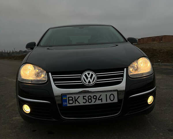 Черный Фольксваген Джетта, объемом двигателя 1.4 л и пробегом 216 тыс. км за 7500 $, фото 10 на Automoto.ua