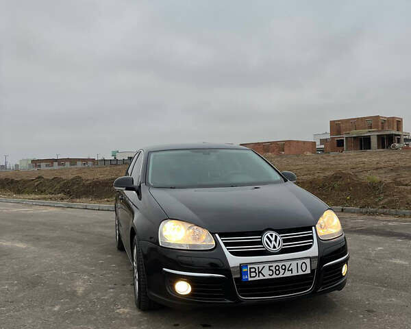 Черный Фольксваген Джетта, объемом двигателя 1.4 л и пробегом 216 тыс. км за 7500 $, фото 15 на Automoto.ua