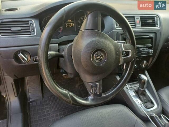 Черный Фольксваген Джетта, объемом двигателя 2.48 л и пробегом 220 тыс. км за 7800 $, фото 4 на Automoto.ua