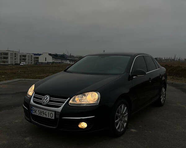 Черный Фольксваген Джетта, объемом двигателя 1.4 л и пробегом 216 тыс. км за 7500 $, фото 13 на Automoto.ua