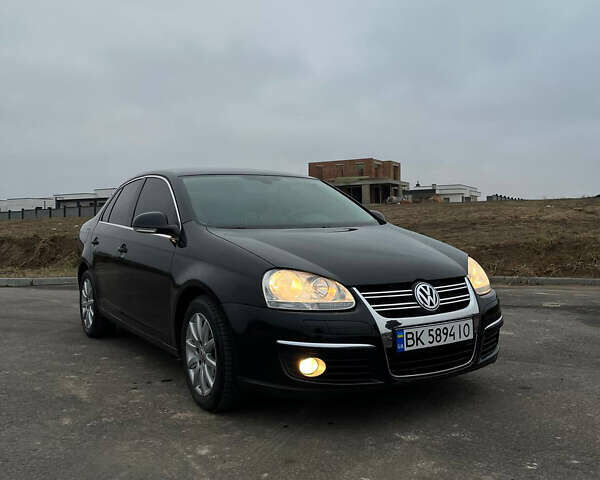 Черный Фольксваген Джетта, объемом двигателя 1.4 л и пробегом 216 тыс. км за 7500 $, фото 26 на Automoto.ua
