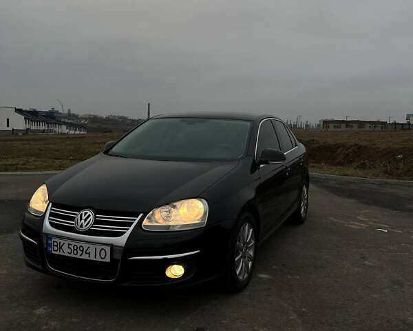 Черный Фольксваген Джетта, объемом двигателя 1.4 л и пробегом 216 тыс. км за 7500 $, фото 11 на Automoto.ua