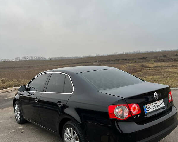 Черный Фольксваген Джетта, объемом двигателя 1.4 л и пробегом 216 тыс. км за 7500 $, фото 24 на Automoto.ua