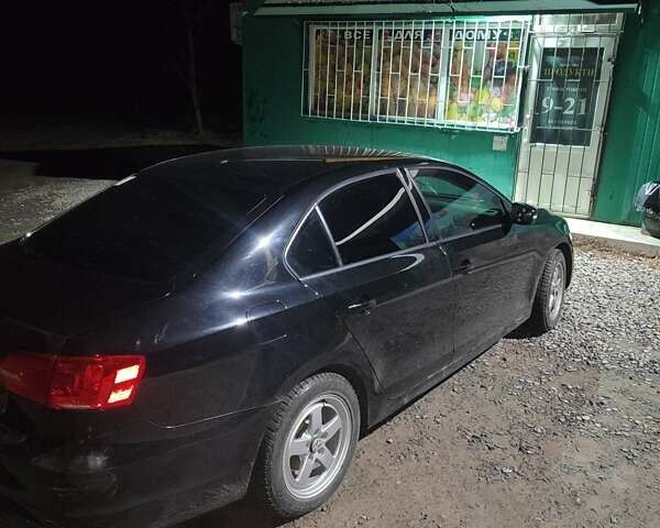 Черный Фольксваген Джетта, объемом двигателя 2.48 л и пробегом 269 тыс. км за 7800 $, фото 4 на Automoto.ua