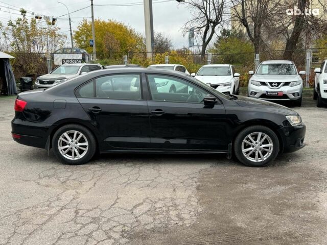 Черный Фольксваген Джетта, объемом двигателя 1.6 л и пробегом 279 тыс. км за 8690 $, фото 4 на Automoto.ua