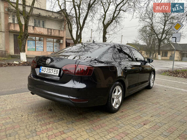 Черный Фольксваген Джетта, объемом двигателя 1.2 л и пробегом 112 тыс. км за 7800 $, фото 6 на Automoto.ua