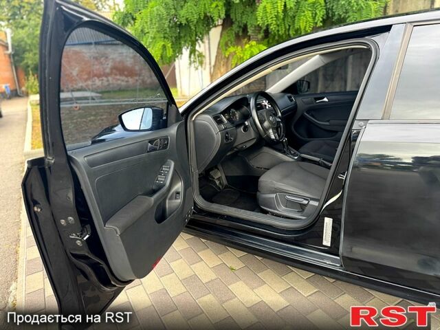 Черный Фольксваген Джетта, объемом двигателя 2 л и пробегом 215 тыс. км за 7800 $, фото 5 на Automoto.ua