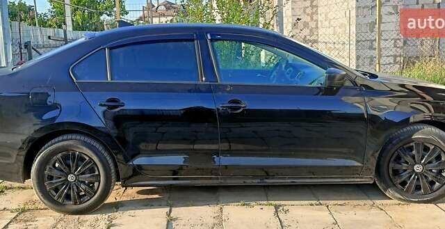 Чорний Фольксваген Джетта, об'ємом двигуна 2 л та пробігом 223 тис. км за 7800 $, фото 2 на Automoto.ua