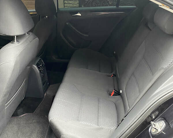 Черный Фольксваген Джетта, объемом двигателя 1.2 л и пробегом 112 тыс. км за 7800 $, фото 20 на Automoto.ua