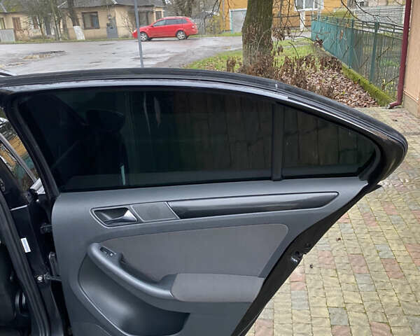 Черный Фольксваген Джетта, объемом двигателя 1.2 л и пробегом 112 тыс. км за 7800 $, фото 18 на Automoto.ua