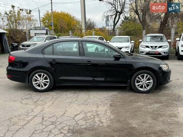 Черный Фольксваген Джетта, объемом двигателя 1.6 л и пробегом 279 тыс. км за 8690 $, фото 5 на Automoto.ua