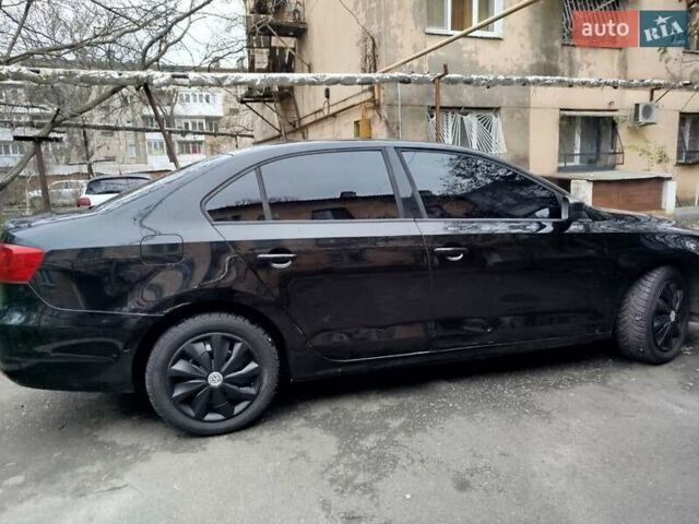 Черный Фольксваген Джетта, объемом двигателя 1.98 л и пробегом 226 тыс. км за 6800 $, фото 7 на Automoto.ua