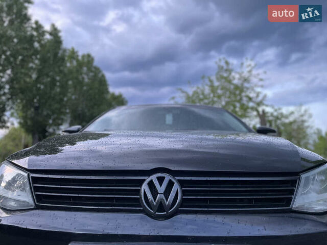 Чорний Фольксваген Джетта, об'ємом двигуна 1.39 л та пробігом 199 тис. км за 8499 $, фото 25 на Automoto.ua