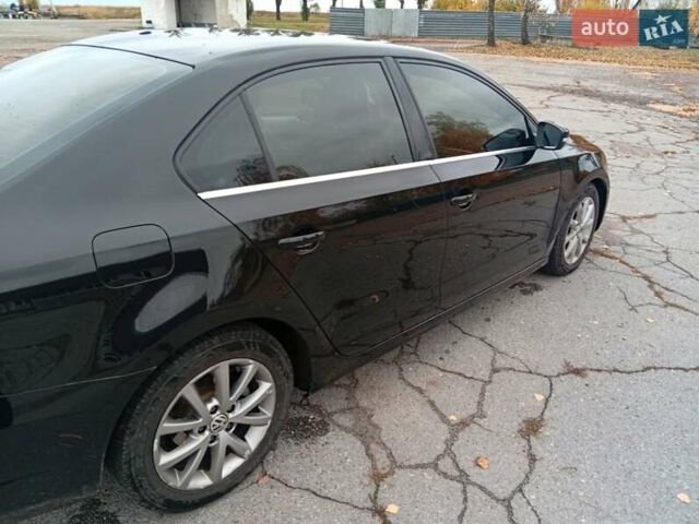 Фольксваген Джетта 2012 в Чернигове на Automoto.ua Черный Фольксваген Джетта, объемом двигателя 2.48 л и пробегом 225 тыс. км за 8600 $, фото 4 на Automoto.ua