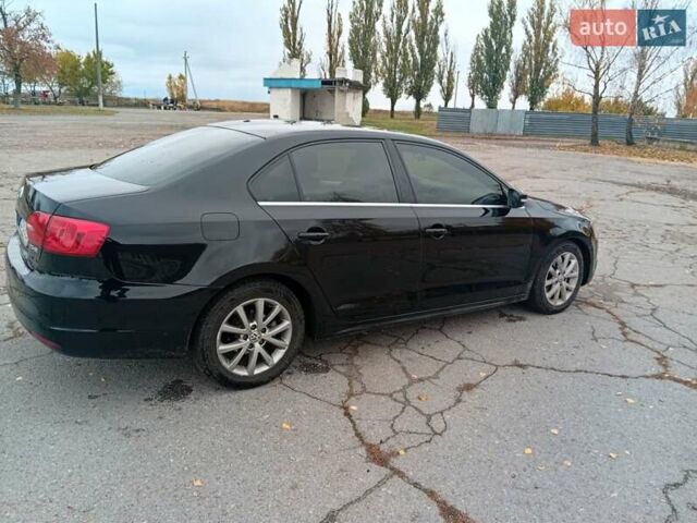 Фольксваген Джетта 2012 в Чернигове на Automoto.ua Черный Фольксваген Джетта, объемом двигателя 2.48 л и пробегом 225 тыс. км за 8600 $, фото 6 на Automoto.ua
