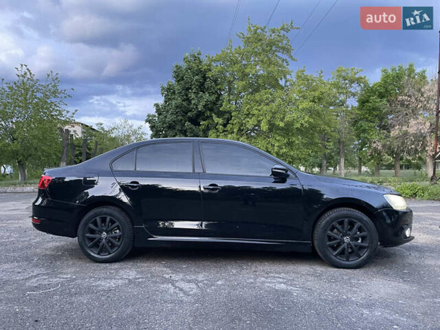 Чорний Фольксваген Джетта, об'ємом двигуна 1.39 л та пробігом 199 тис. км за 8499 $, фото 30 на Automoto.ua