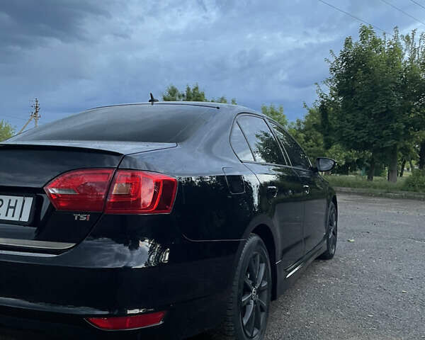 Чорний Фольксваген Джетта, об'ємом двигуна 1.39 л та пробігом 199 тис. км за 8499 $, фото 6 на Automoto.ua