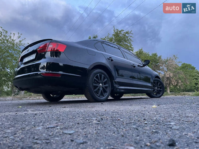 Чорний Фольксваген Джетта, об'ємом двигуна 1.39 л та пробігом 199 тис. км за 8499 $, фото 1 на Automoto.ua