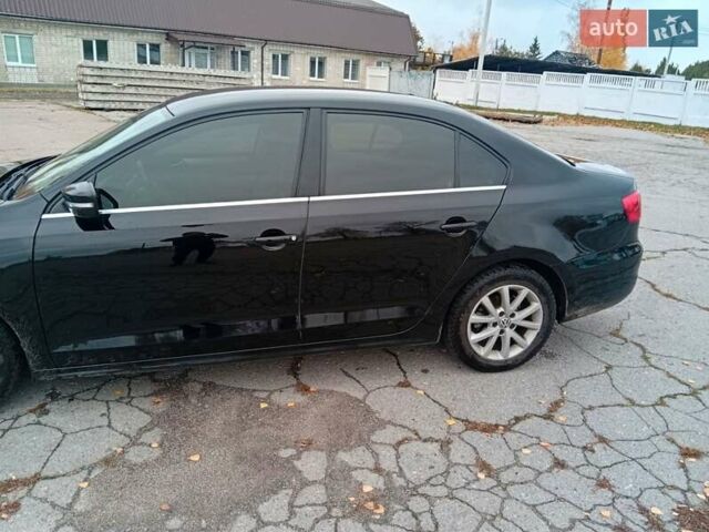 Фольксваген Джетта 2012 в Чернигове на Automoto.ua Черный Фольксваген Джетта, объемом двигателя 2.48 л и пробегом 225 тыс. км за 8600 $, фото 9 на Automoto.ua