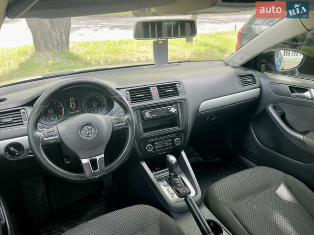 Чорний Фольксваген Джетта, об'ємом двигуна 1.39 л та пробігом 199 тис. км за 8499 $, фото 36 на Automoto.ua