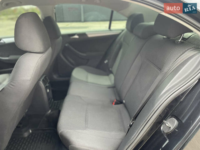 Чорний Фольксваген Джетта, об'ємом двигуна 1.39 л та пробігом 199 тис. км за 8499 $, фото 33 на Automoto.ua