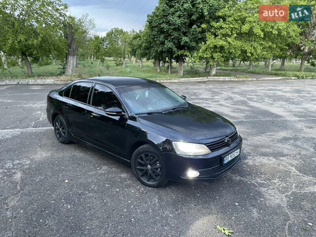 Чорний Фольксваген Джетта, об'ємом двигуна 1.39 л та пробігом 199 тис. км за 8499 $, фото 5 на Automoto.ua