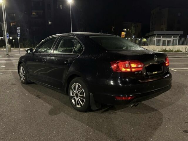 Черный Фольксваген Джетта, объемом двигателя 1.4 л и пробегом 282 тыс. км за 5874 $, фото 1 на Automoto.ua