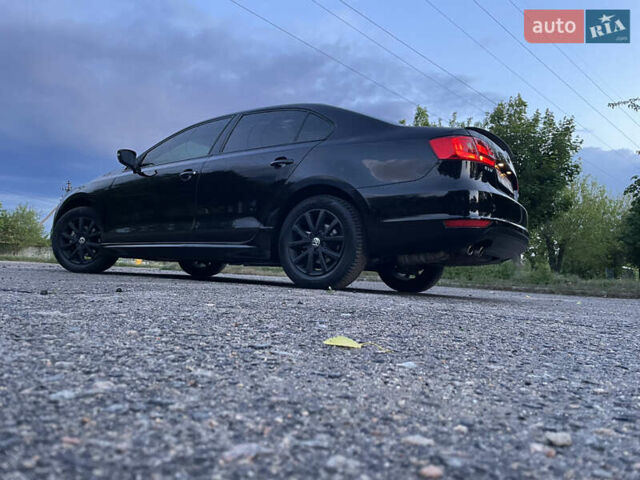 Чорний Фольксваген Джетта, об'ємом двигуна 1.39 л та пробігом 199 тис. км за 8499 $, фото 3 на Automoto.ua