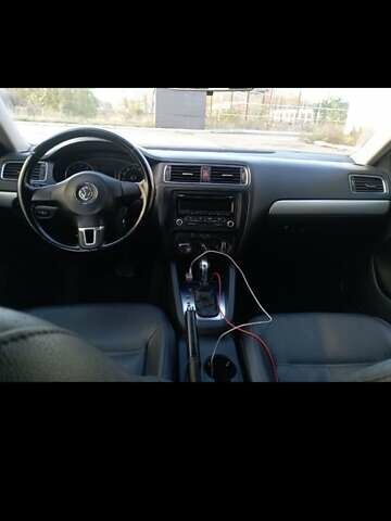 Фольксваген Джетта 2012 в Чернигове на Automoto.ua Черный Фольксваген Джетта, объемом двигателя 2.48 л и пробегом 225 тыс. км за 8600 $, фото 1 на Automoto.ua