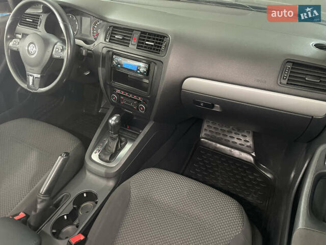 Чорний Фольксваген Джетта, об'ємом двигуна 1.39 л та пробігом 199 тис. км за 8499 $, фото 21 на Automoto.ua