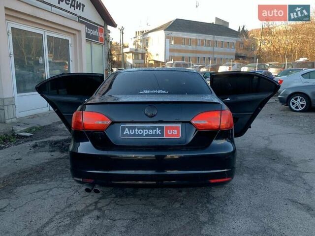 Чорний Фольксваген Джетта, об'ємом двигуна 2 л та пробігом 219 тис. км за 8990 $, фото 12 на Automoto.ua