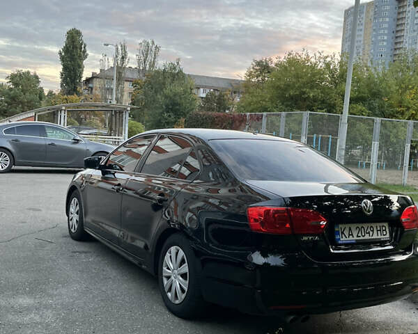 Чорний Фольксваген Джетта, об'ємом двигуна 2 л та пробігом 150 тис. км за 9300 $, фото 5 на Automoto.ua