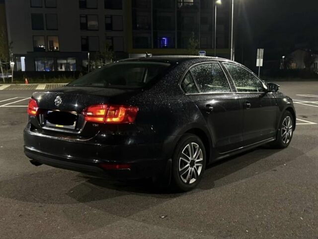 Черный Фольксваген Джетта, объемом двигателя 1.4 л и пробегом 282 тыс. км за 5874 $, фото 3 на Automoto.ua