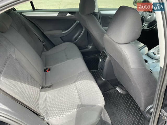 Чорний Фольксваген Джетта, об'ємом двигуна 1.39 л та пробігом 199 тис. км за 8499 $, фото 31 на Automoto.ua